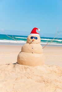 Heat Resistent Snowman Sunbathing On Beach